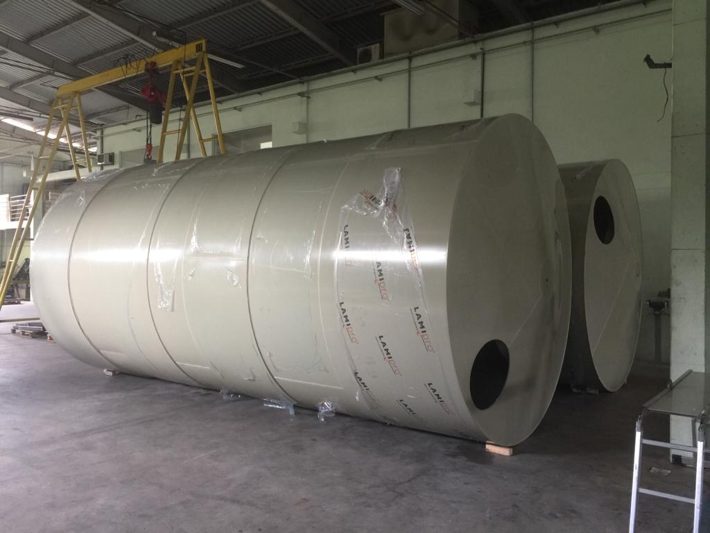 Large fabricated polypropylene tank inside an industrial workshop